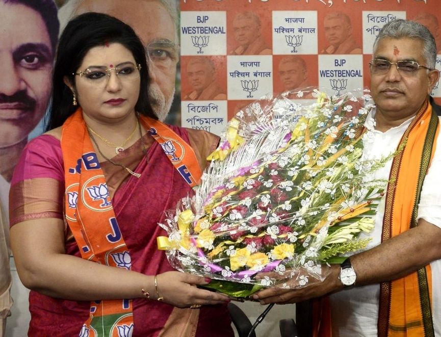 Kolkata: West Bengal BJP chief Dilip Ghosh felicitates professor Baisakhi Chatterjee, who recently joined the BJP, at the state party headquarters in Kolkata on Aug 20, 2019. (Photo: Kuntal Chakrabarty/IANS)