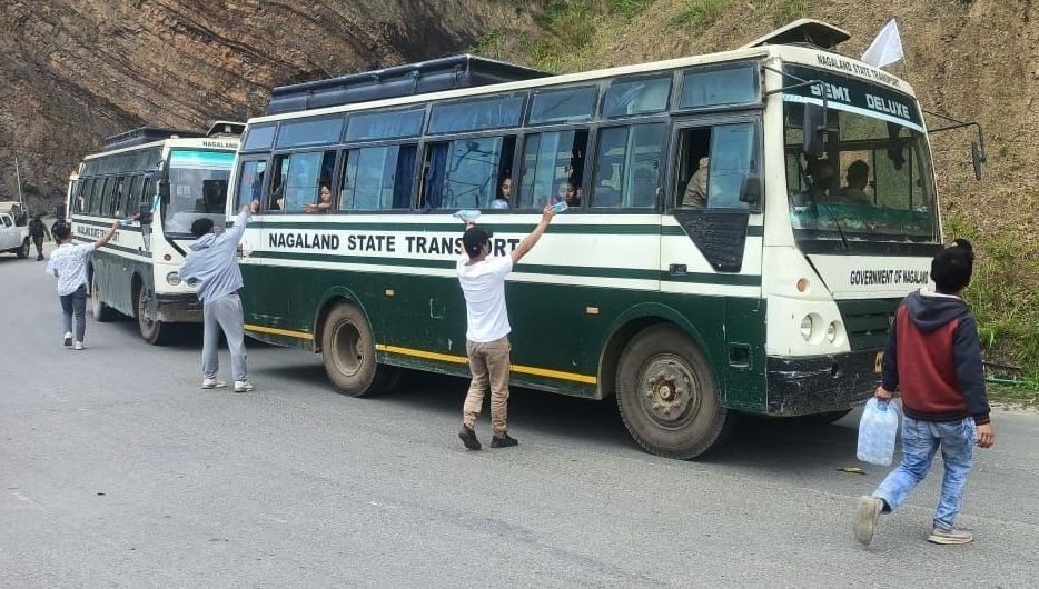 Members of Mao Union Senapati offer refreshment to citizens of Nagaland, being evacuated from Imphal as well as their escorts in Senapati on May 7.