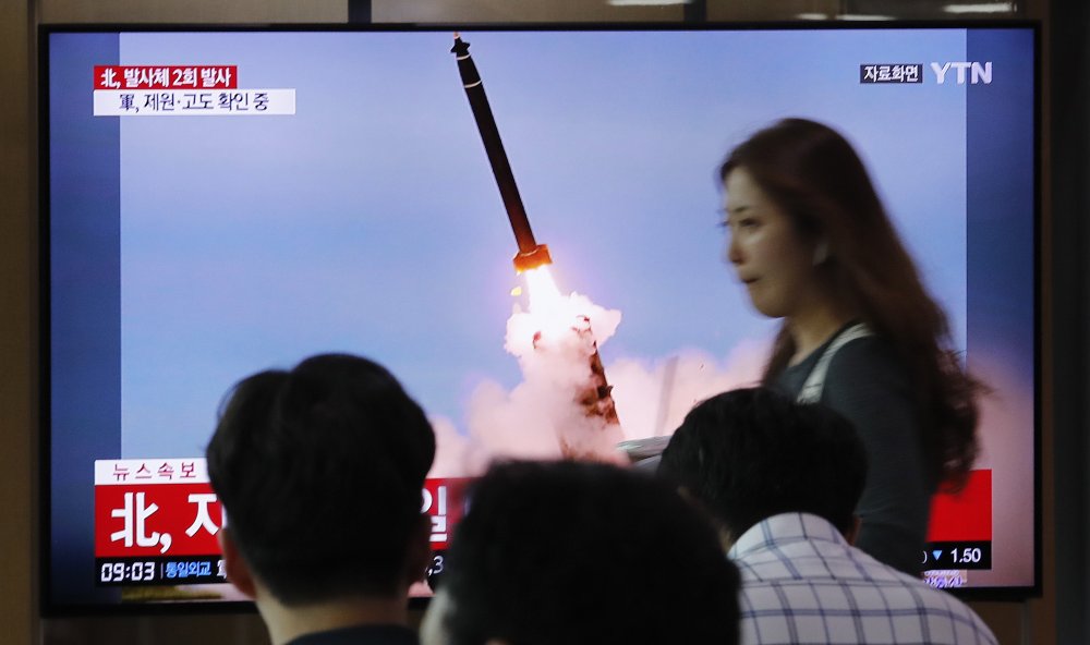 North Korea fires 2 projectiles after offering talks with US