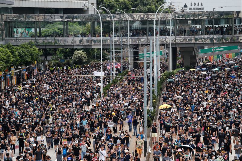 Pro-democracy protesters march to protest against police violence during previous marches, in central Hong Kong, China July 28, 2019. REUTERS/Tyrone Siu