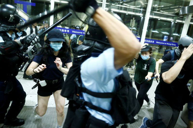 China says Hong Kong protests 'near terrorism' as airport reopens