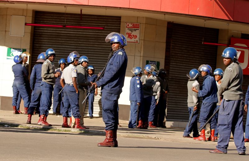 Zimbabwe police beat protesters as opposition denounces 'fascist' government