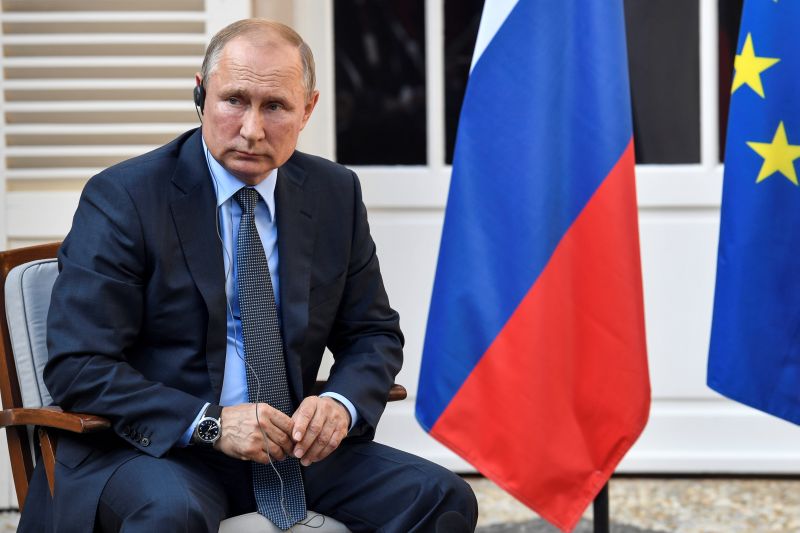 France's Macron urges Putin to respect democracy