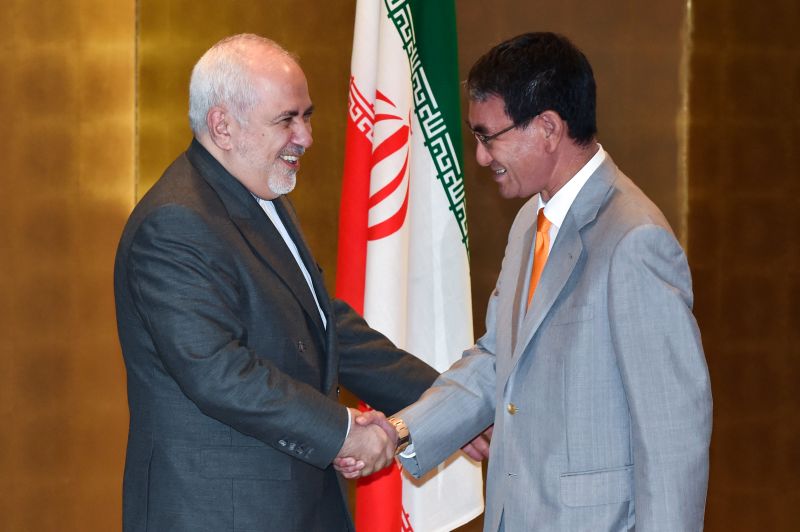 Japan minister, meeting Iranian counterpart, urges Iran to abide by nuclear deal