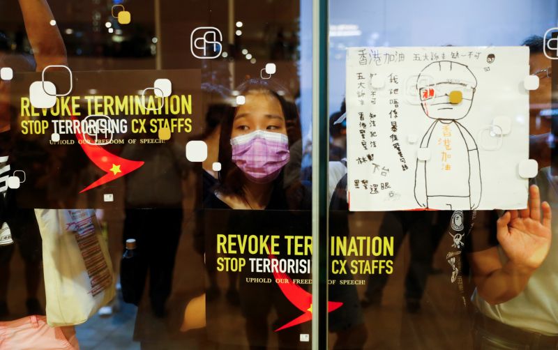 Hong Kong protesters denounce Cathay Pacific for firing cabin crew