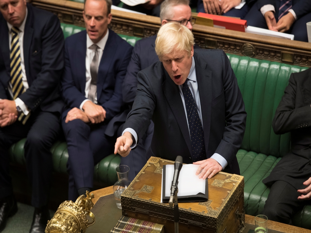 Opponents of 'no-deal' Brexit defeat PM Johnson, who promises an election