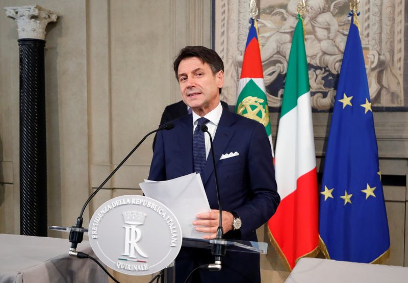 Italian PM sets seal on new government, unveils cabinet