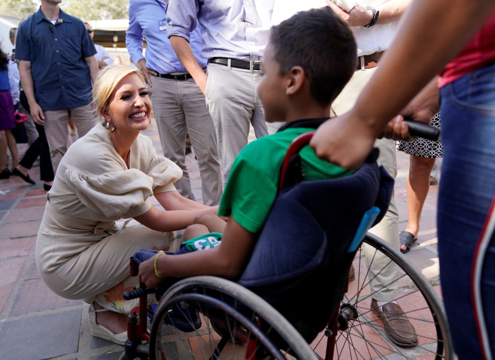 White House adviser Ivanka Trump greets a handicapped boy during a visit to a center for Venezuelan migrants in Cucuta, Colombia, September 4, 2019.  REUTERS/Kevin Lamarque