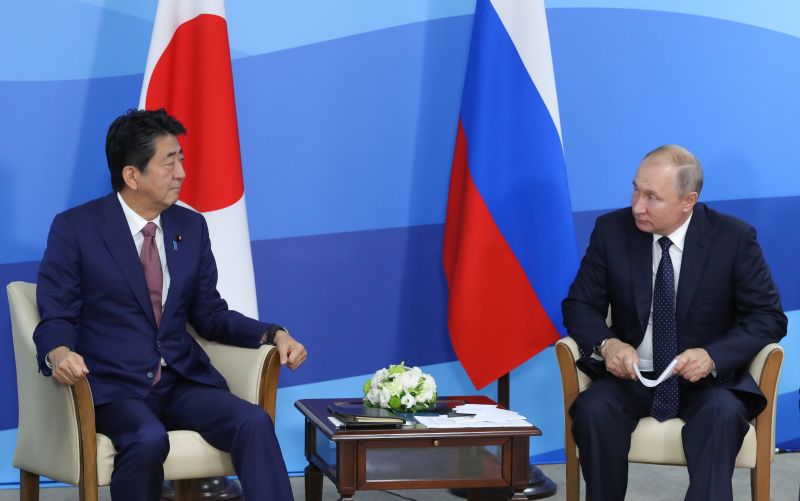 Putin rebuffs call by Japan's Abe to sign World War Two peace treaty