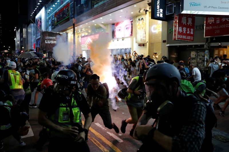 Hong Kong protesters hurl petrol bombs at government buildings in latest wave of unrest