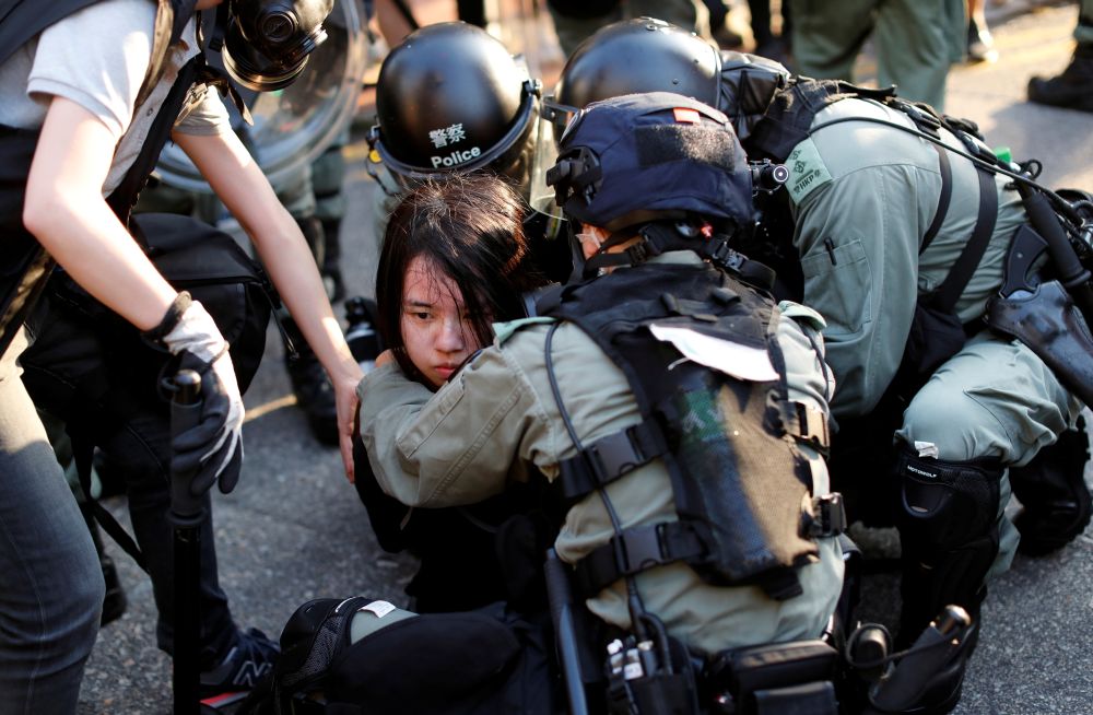 Hong Kong police fire tear gas to break up protesters
