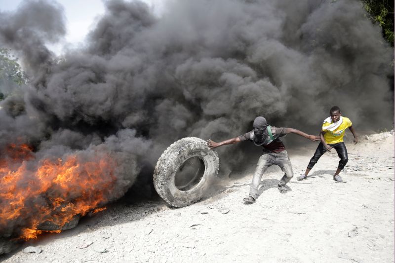 Haitian protesters clash with police in new push for president's ouster