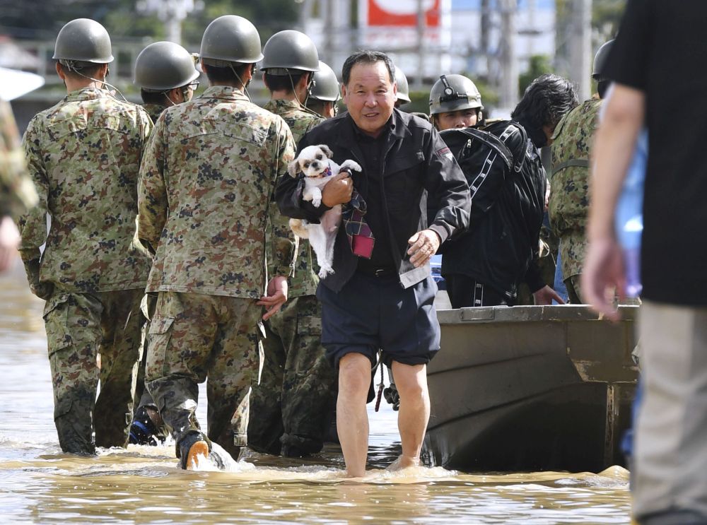 Japan sends in troops after massive typhoon hammers Tokyo, kills 23