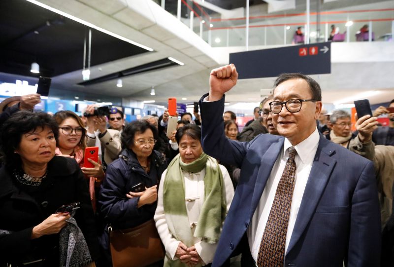 Cambodia opposition founder says he was blocked from boarding plane home from Paris