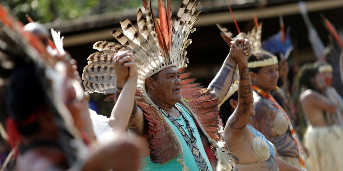 Indigenous people from the Shanenawa tribe dance during a festival to celebrate nature and ask for an end to the burning of the Amazon, in the indigenous village of Morada Nova near Feijo, Acre State, Brazil, September 1, 2019. REUTERS/Ueslei Marcelino