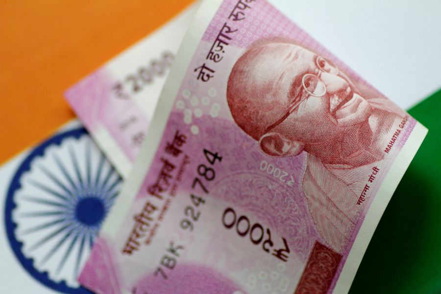 India's economy grows slowly in Dec quarter, with virus impact to come