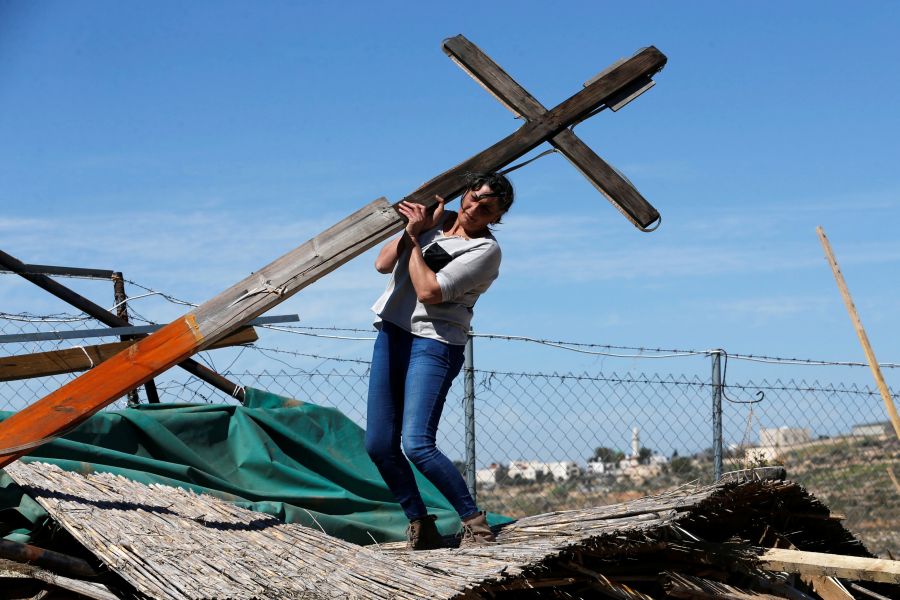 Palestinians protest as Israeli bulldozers clear land