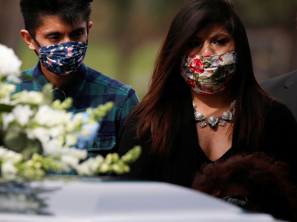 Family members of JBS USA meat packing plant employee Saul Sanchez attend his funeral after he died of coronavirus disease (COVID-19) in Greeley, Colorado, U.S., April 15, 2020. REUTERS/Jim Urquhart
