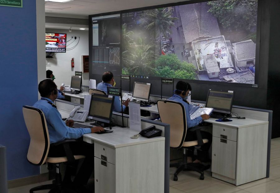 With drones and tests, India battles to keep virus out of Mumbai's slums