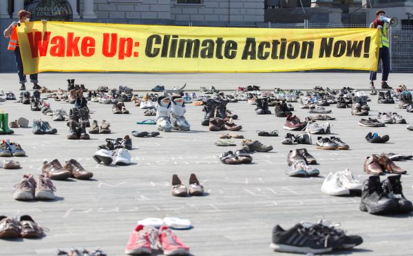 Shoes replace protesters as Swiss climate activists obey virus curbs