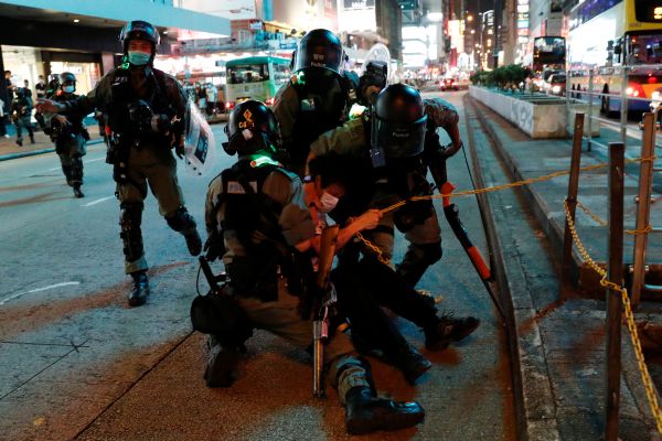 Hong Kong police arrest more than 200 as pro-democracy protests return