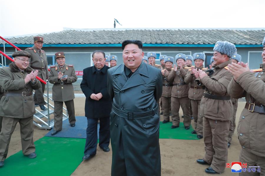 An undated photo released by the official North Korean Central News Agency (KCNA) shows Kim Jong-un (C), chairman of the Workers' Party of Korea, chairman of the State Affairs Commission of the Democratic People's Republic of Korea and supreme commander o