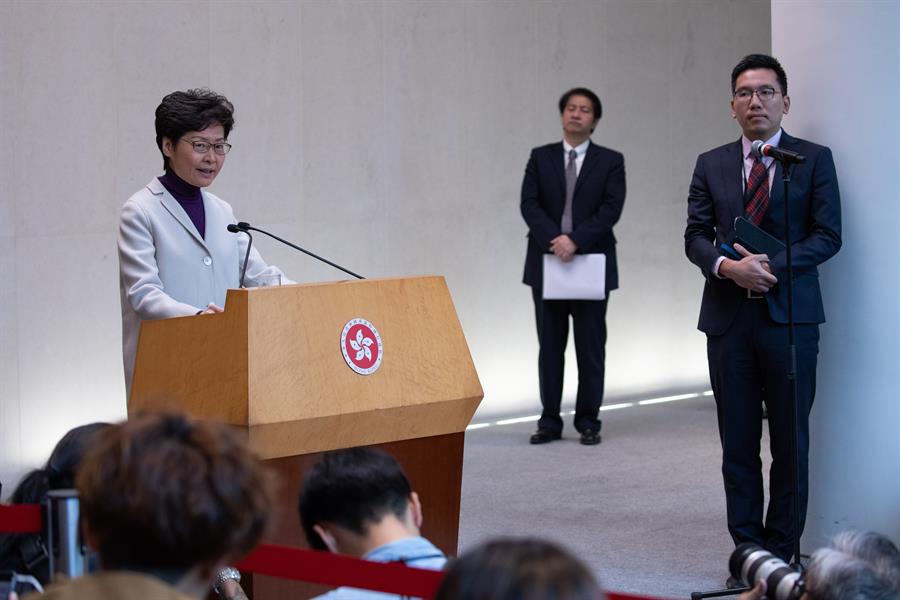 Hong Kong leader closes ranks with Beijing, condemns US law