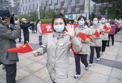 Over 800 people stranded in virus-hit Wuhan return to Beijing