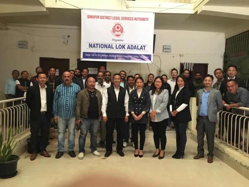1Members of Dimapur District Legal Services Authority after the observance of National Lok Adalat on December 14. 