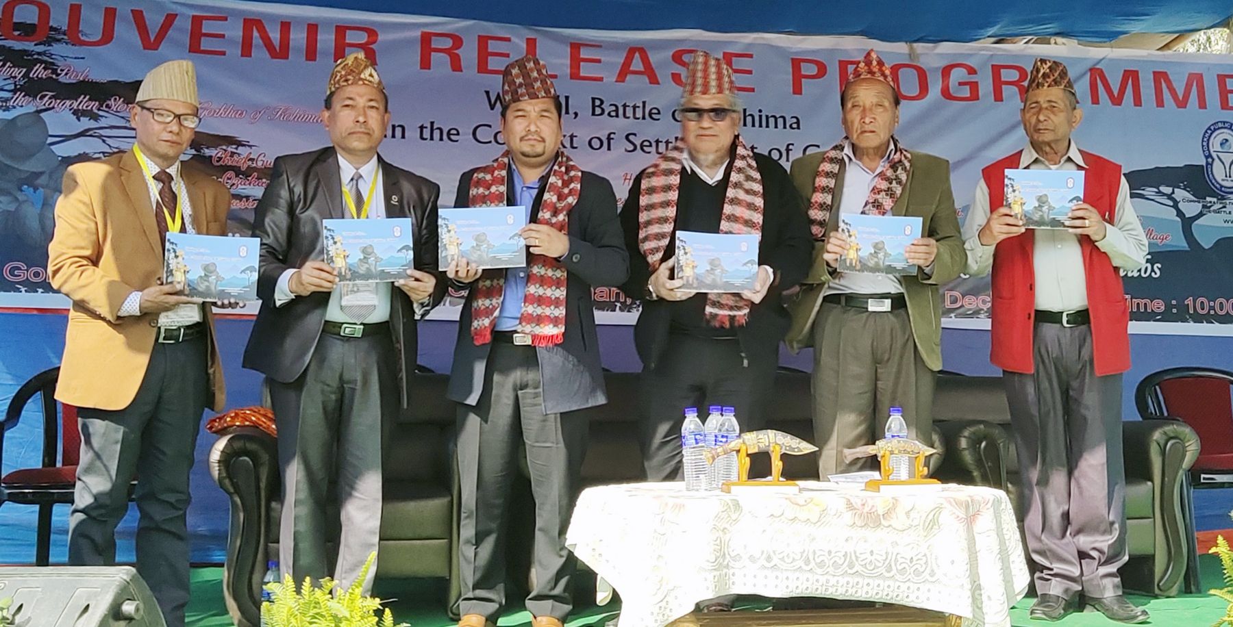 Tongpang Ozukum, Dr. Neikiesalie Kire, Thepfuvilie Suohu and GPPK officials during the release of souvenir marking 75th year of Battle of Kohima in the context of settlement of Gorkhas on December 18. (Morung Photo)
