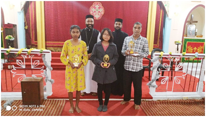 Toppers with MGOS members after the celebration of the 117th remembrance feast on November 10.