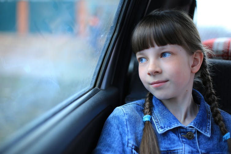 Curious Kids: why does reading in the back seat make you feel sick?