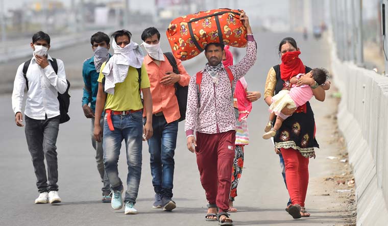 Live or die we'll not stop: Migrants set off for 700km on foot as govt starts AC trains