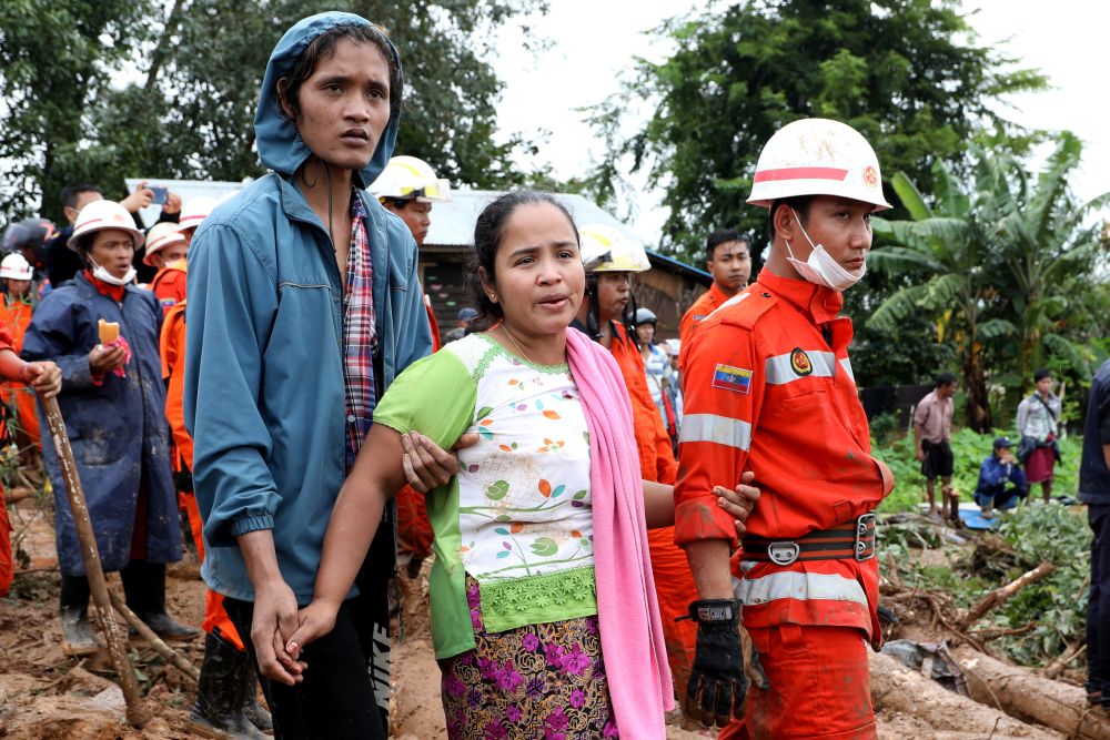 Nyo Nyo Win, who lost 9 family members in a landslide stands near her house in Mottama, Mon state, Myanmar, August 10, 2019. REUTERS/Ann Wang