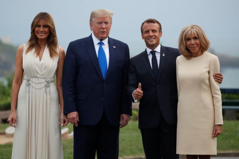 French President Emmanuel Macron and his wife Brigitte Macron welcome U.S. President Donald Trump and First Lady Melania Trump at the G7 summit in Biarritz, France, August 24, 2019. REUTERS/Christian Hartmann