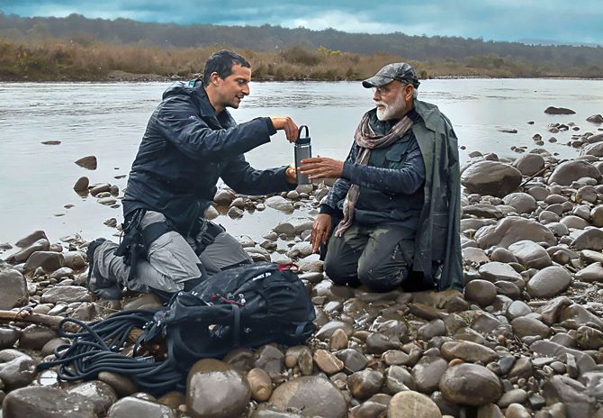 New Delhi: In this undated image provided by Discovery channel is seen Prime Minister Narendra Modi featuring in the channel's popular franchise ‘Man Vs Wild’ with world renowned survivalist and adventurer Bear Grylls. (PTI Photo)(PTI7_29_2019_000094B)