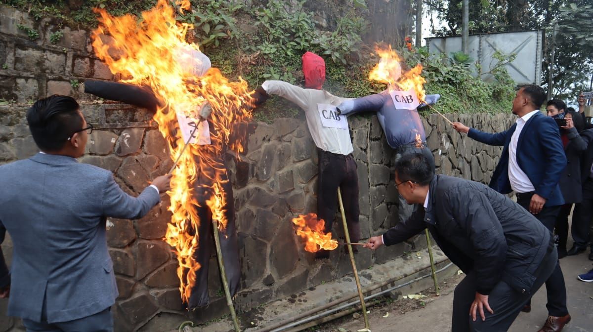  Protestors burn effigies of CAB. (Morung Photo)