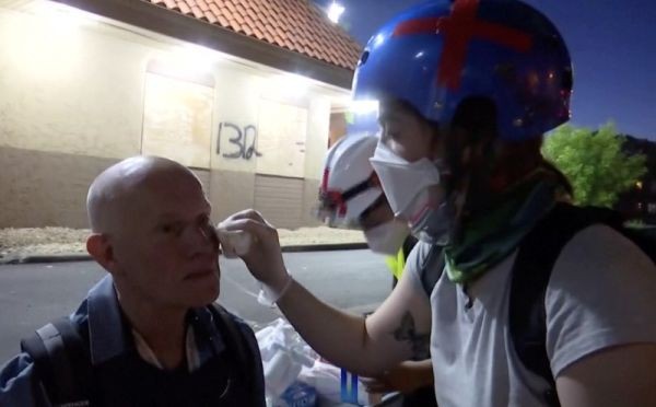 Reuters security advisor Rodney Seward is treated by a medic for a deep gash under his left eye after being struck by a rubber bullet during nationwide unrest following the death of George Floyd in Minneapolis police custody, in Minneapolis, Minnesota, US on May 30, 2020. (REUTERS TV Photo)