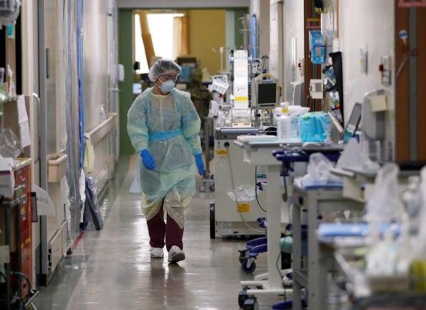 A medical worker wearing personal protective equipment (PPE) works in the Intensive Care Unit (ICU) for coronavirus disease (COVID-19) patients at St. Marianna Medical University Hospital in Kawasaki, south of Tokyo, Japan on May 4, 2020. (REUTERS File Ph