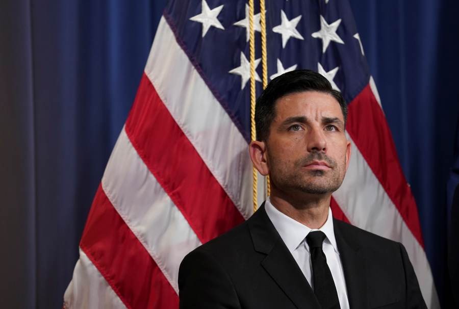 Acting Homeland Security Secretary Chad Wolf looks up during the launch of a new initiative to combat online child sexual exploitation during a news conference at the Department of Justice in Washington, U.S., March 5, 2020. REUTERS/File photo