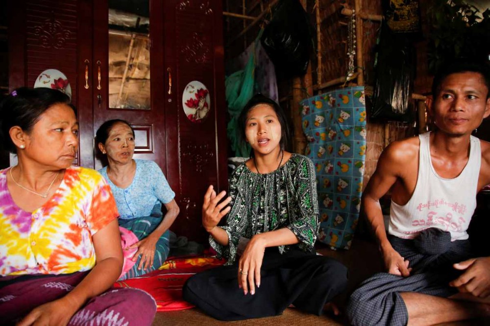 Zar Chi Liwn talks to reporters in her hostel in an industrial zone on the outskirts of Yangon, Myanmar April 28, 2020. Picture taken April 28, 2020. (REUTERS/Myat Thu Kyaw)