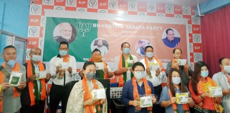 Temjen Imna Along and others during the launching of Kharif crop seeds distribution in Kohima on May 28.