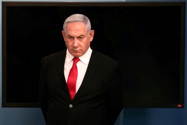 Israeli Prime Minister Benjamin Netanyahu arrives for a speech at his Jerusalem office, regarding the new measures that will be taken to fight the coronavirus on March 14, 2020. (REUTERS File Photo)