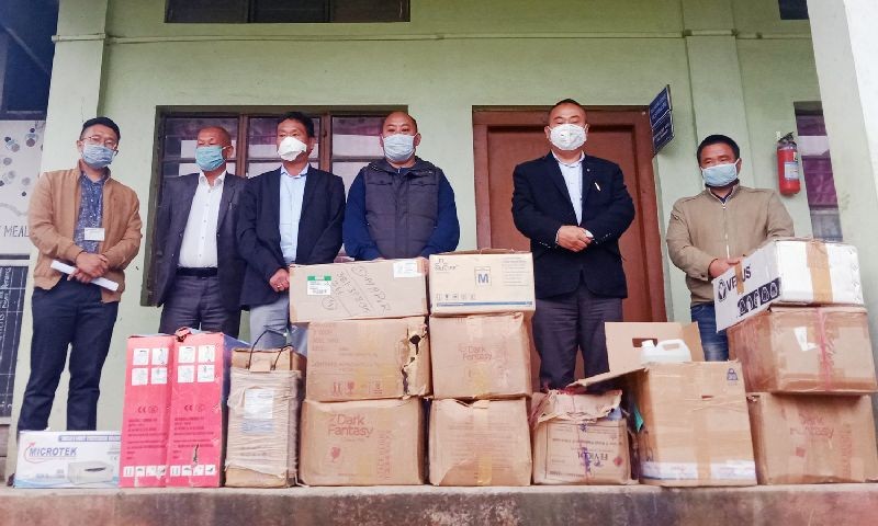 Nagaland's Planning & Coordination, Land Revenue and Parliamentary Affairs Minister Neiba Kronu and others during donation of hospital supplies. (Morung Photo)
