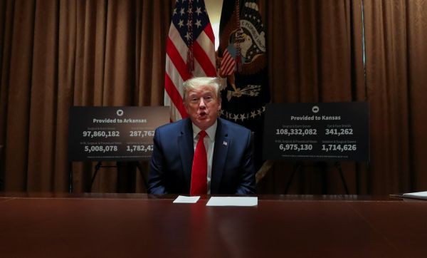 U.S. President Donald Trump speaks about the coronavirus disease (COVID-19) pandemic response during a meeting with Arkansas Governor Asa Hutchinson and Kansas Governor Laura Kelly in the Cabinet Room at the White House in Washington, U.S., May 20, 2020. 