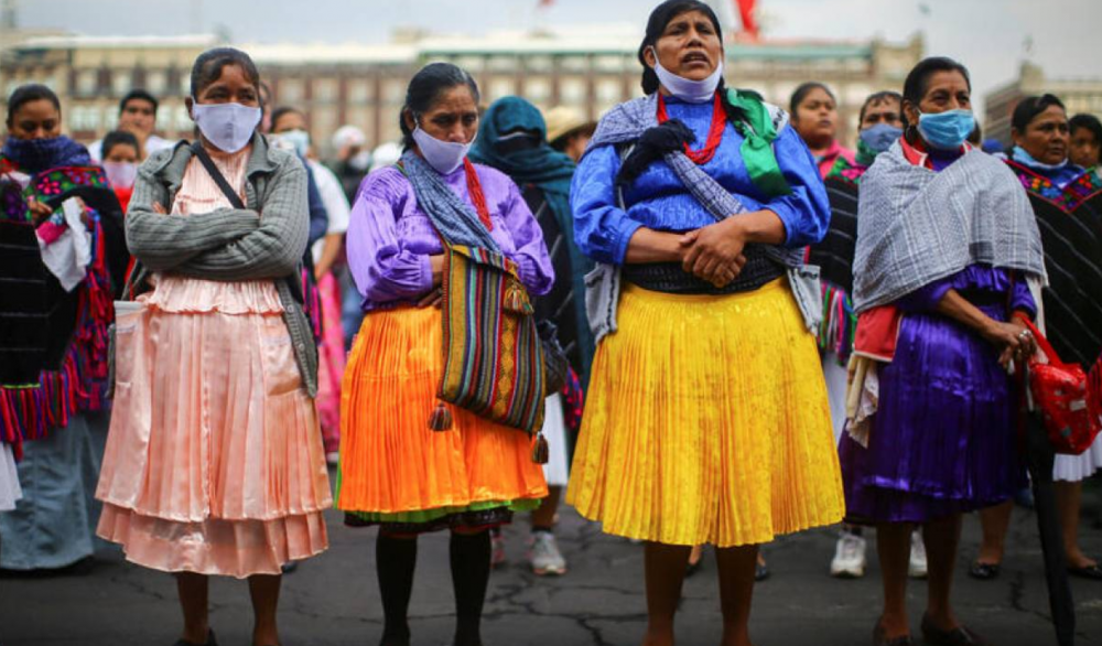 Indigenous people protest outside the National Palace to demand support from Mexico's government, as the outbreak of the coronavirus disease (COVID-19) continues, in Mexico City, Mexico May 11, 2020. REUTERS/Edgard Garrido