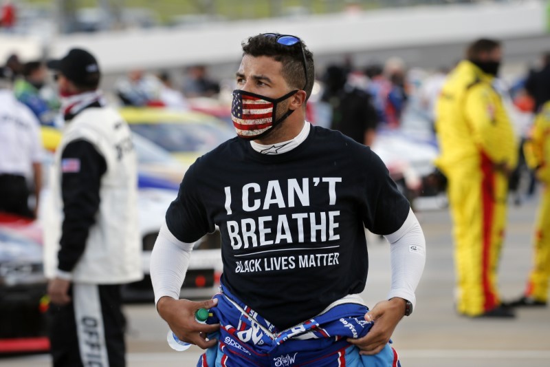 NASCAR driver Bubba Wallace wears a Black Lives Matter shirt as he prepares for the NASCAR Cup Series at Martinsville at Martinsville Speedway on June 10. (Reuters Photo)