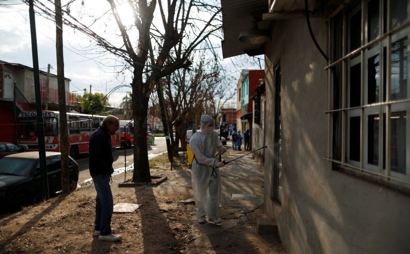 A worker disinfects an area as a preventive measure against the coronavirus disease (COVID-19), in Beccar, on the outskirts of Buenos Aires, Argentina on June 17, 2020. (REUTERS Photo)