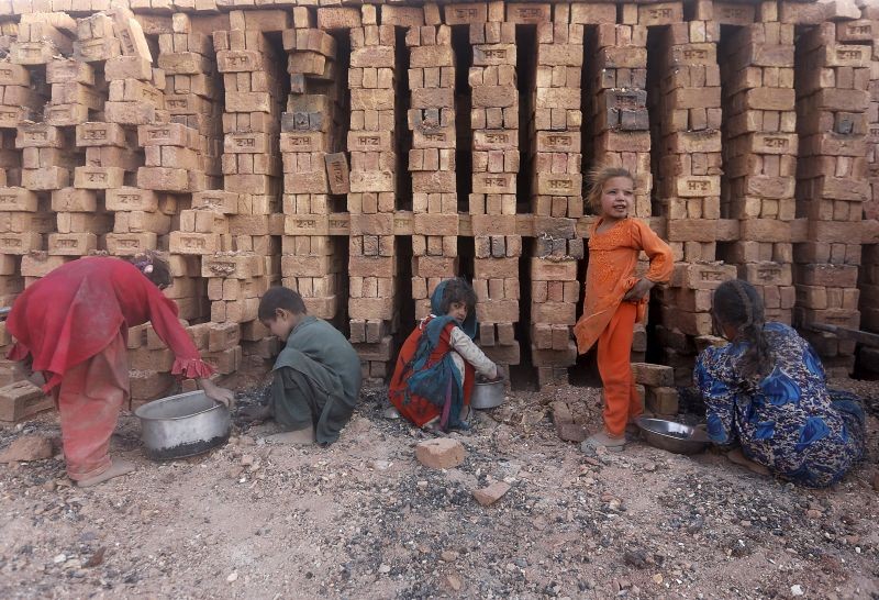 Afghan children work at a brick-making factory outside Kabul, Afghanistan. (REUTERS File Photo)