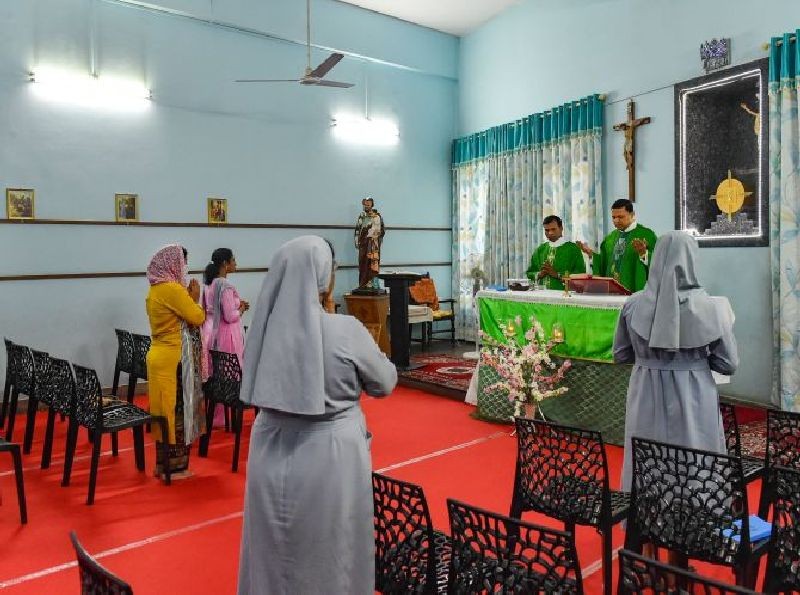 Devotees offer prayers at Cathedral church after all religious places are open with certain restrictions, during the fifth phase of ongoing COVID-19 lockdown, in Lucknow, Monday, June 8, 2020. (PTI Photo/Nand Kumar